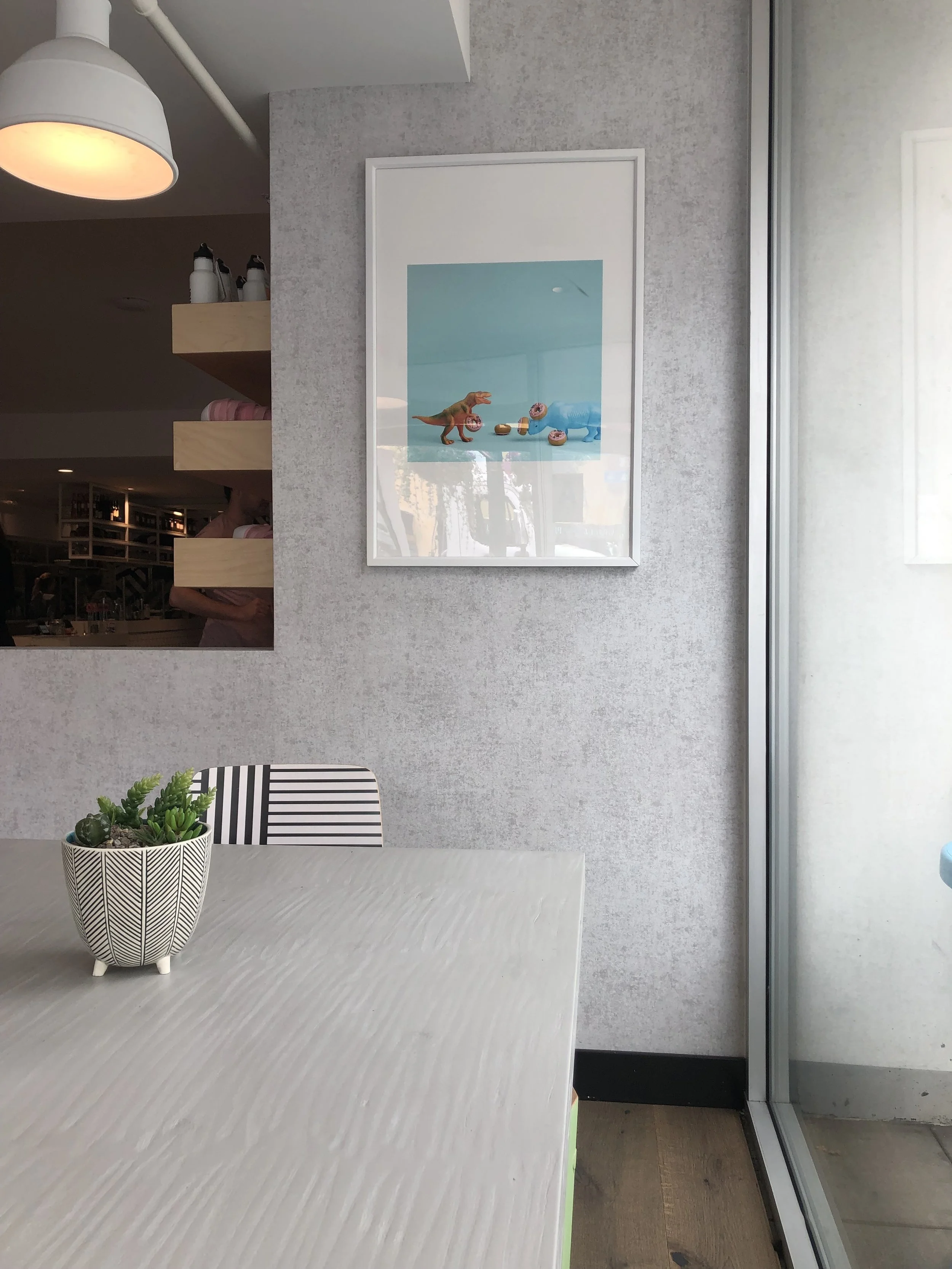 Talk about another cute coffee place: Parakeet Cafe (in little Italy). We stopped in for our usual early afternoon coffee and feed Eleanor her lunch. Everybody wins!