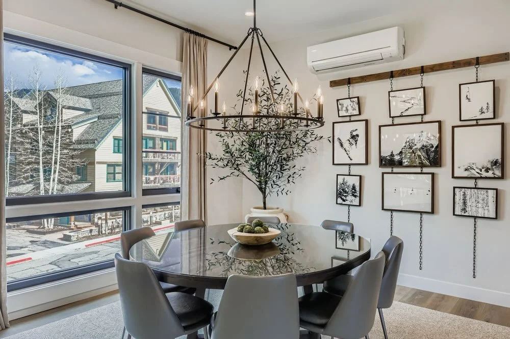 Part two of this mountain modern dream 🤍

This dining space was designed to take in those Keystone village views while still feeling warm, grounded, and inviting. We chose a unique 8-person round table to keep the flow open and conversational, paire