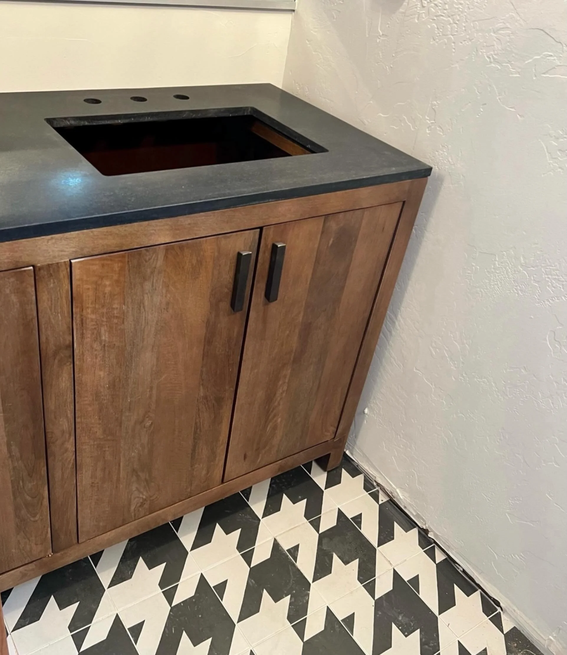One of my favorite parts of this job is getting the chance to step outside the box and try something new. 

This bathroom gave me the perfect opportunity to use a bold houndstooth tile pattern which is something I&rsquo;ve never incorporated into a d