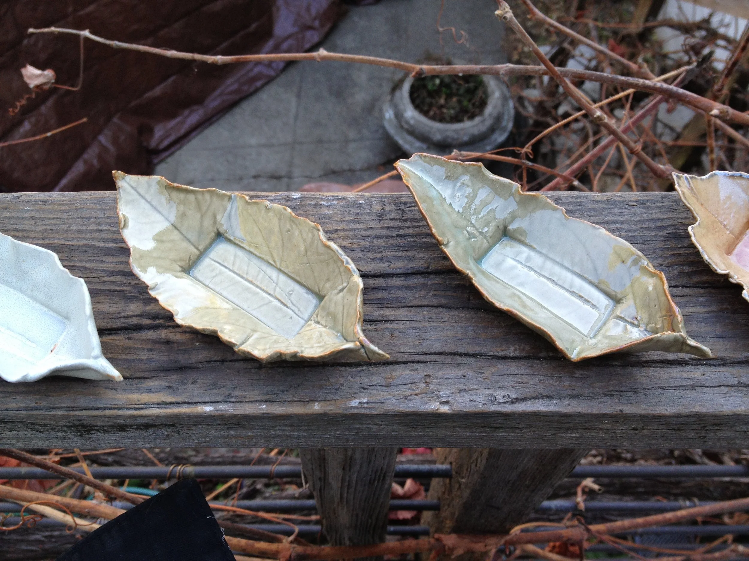 Glazed small plates made from impressed lemon leaves