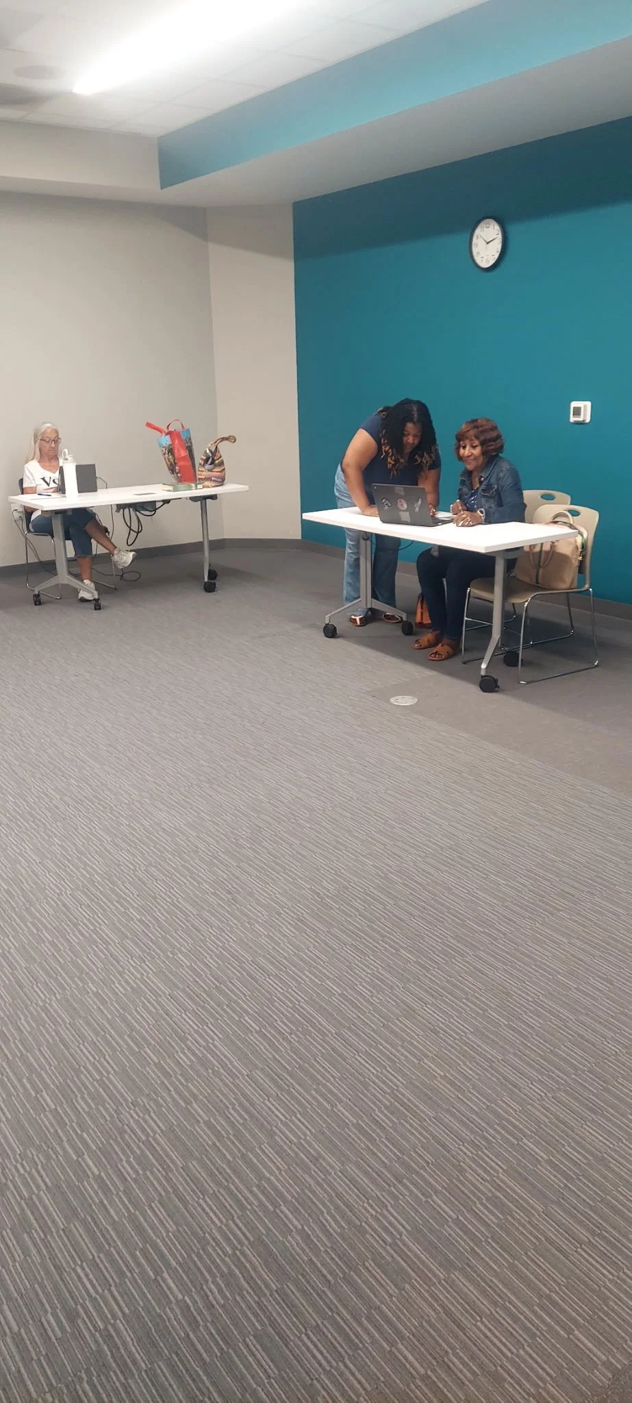  LCDWC members LaRia &amp; Sharon work together on their calling lists. 