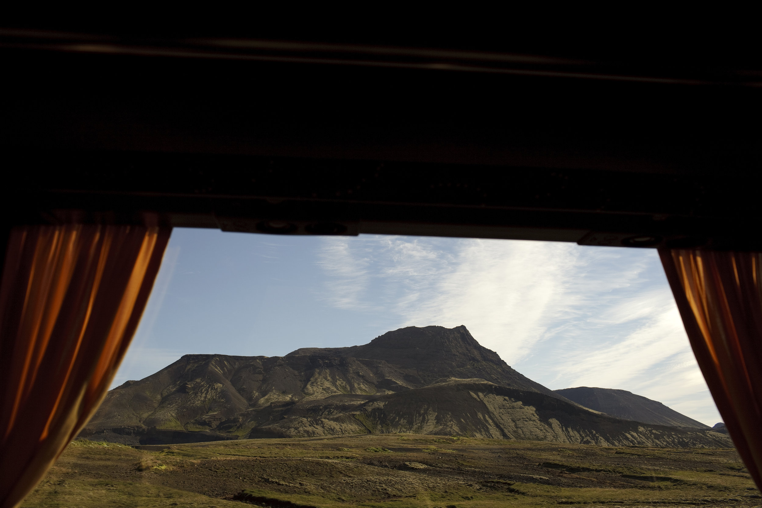  A mountain view from a bus window, headed back into Reykjavik from a small town in southern Iceland. 