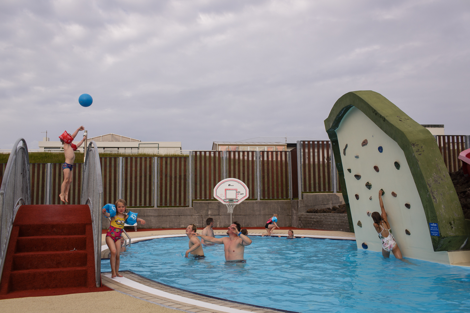  People enjoy the public pool in Heimaey, an island in the Vestmannaeyjar Archipelago off the southern coast of Iceland. 
