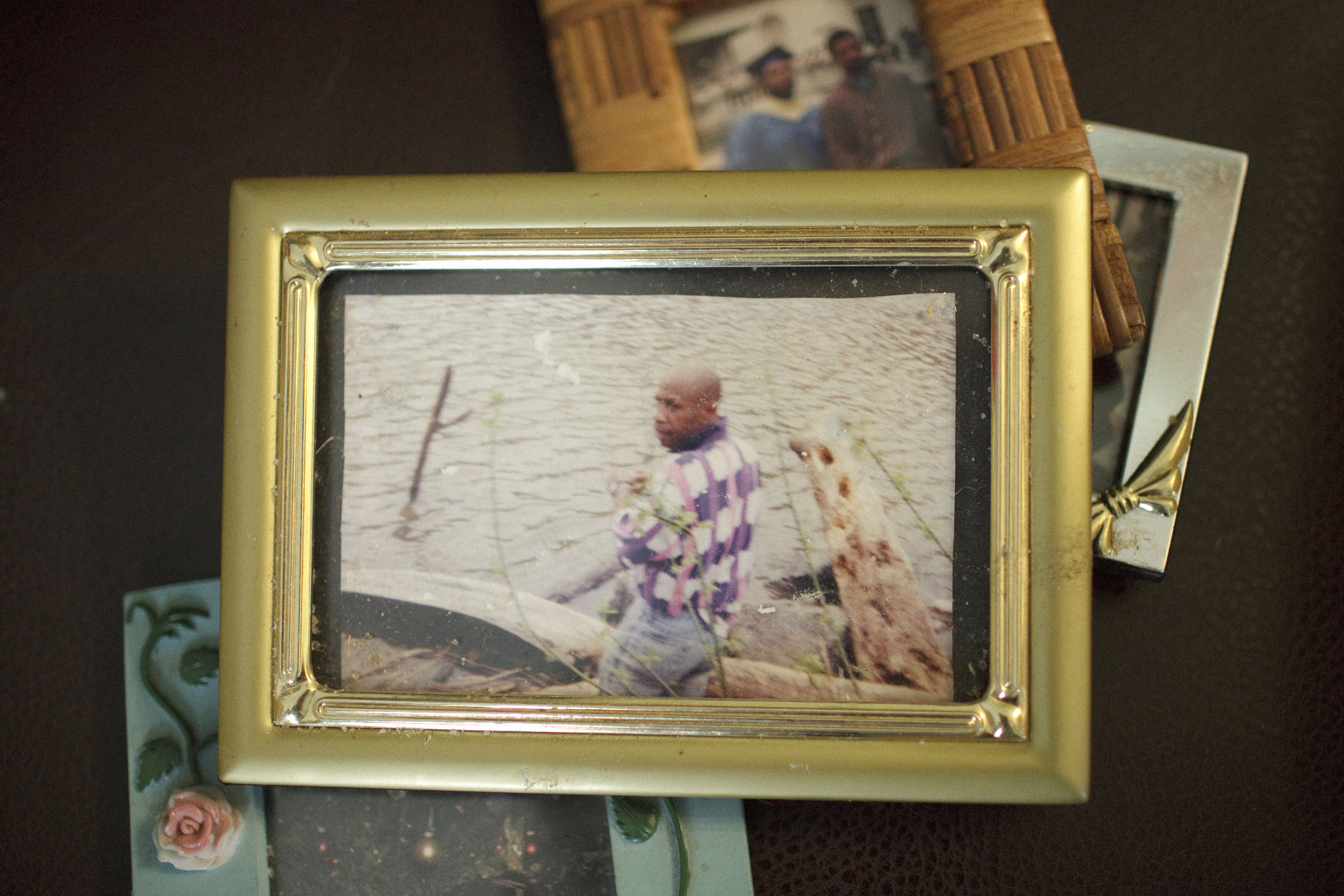  A framed photo of Kojak at the river, taken years earlier. For many, fishing at the river has been a part of their lives for decades. 