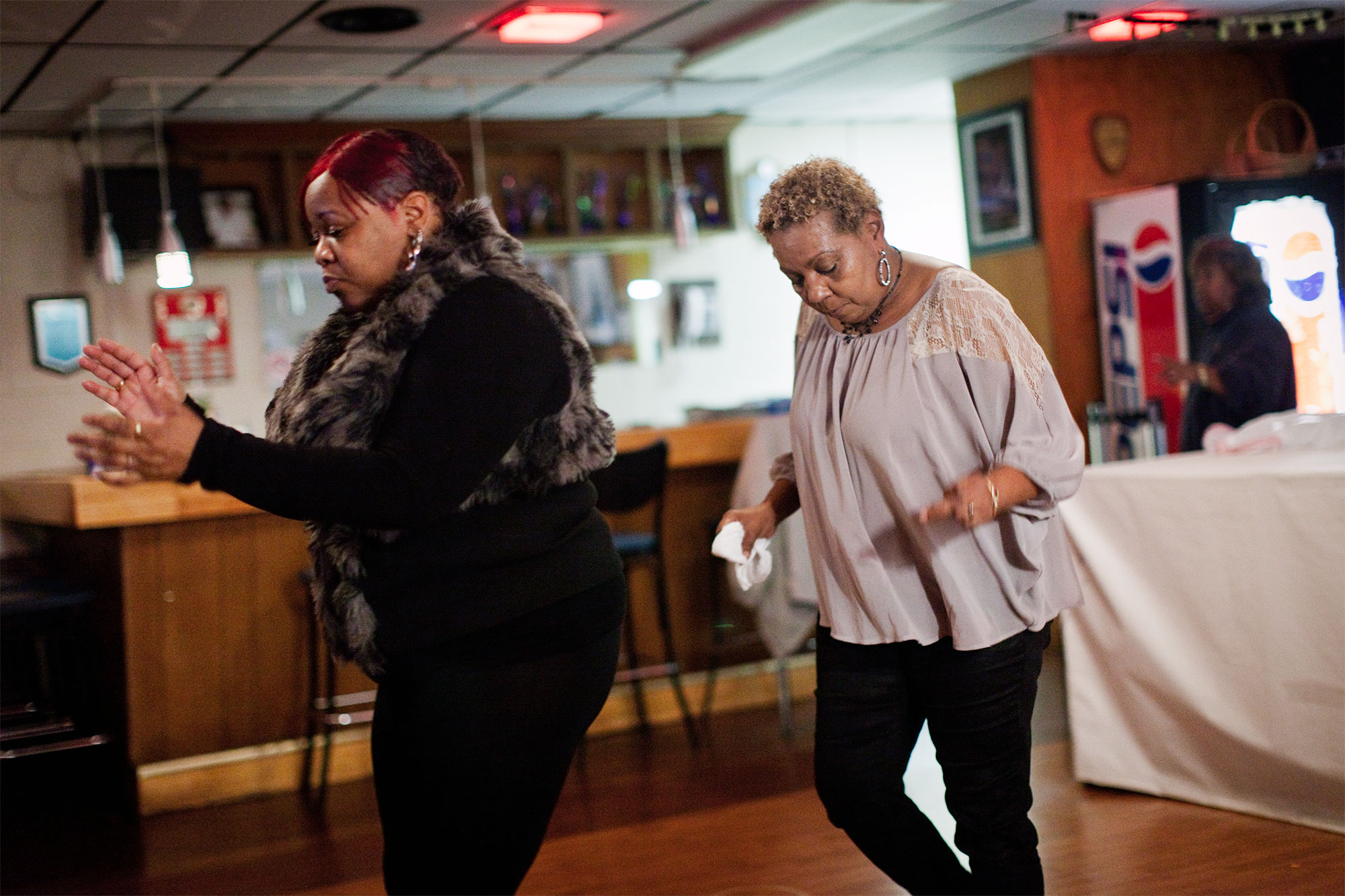  LaVenia Bailey and Irene Hall feel the music at Seafarers Clubhouse on a Friday night in December, 2012. 