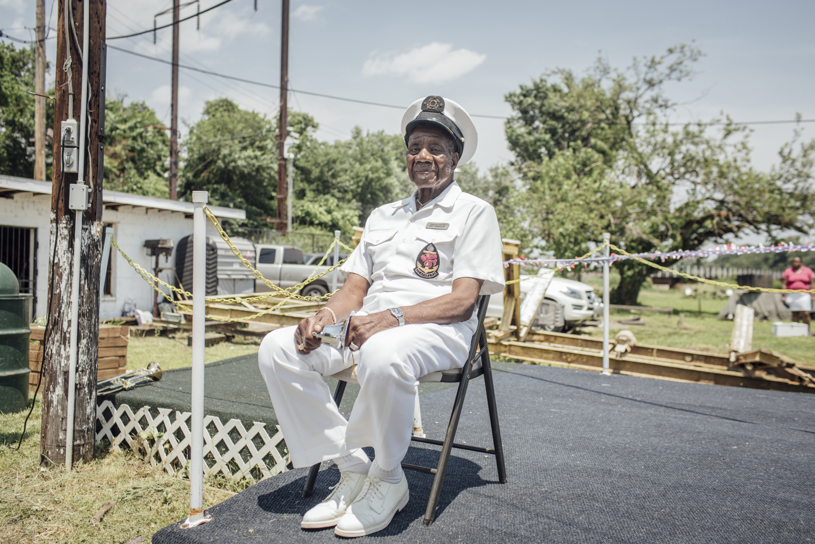  Pictured in his captain’s uniform during the annual flag raising ceremony, Charles "Bob" Martin, 87, is the longest-standing member of Seafarers Yacht Club in Washington, D.C.  