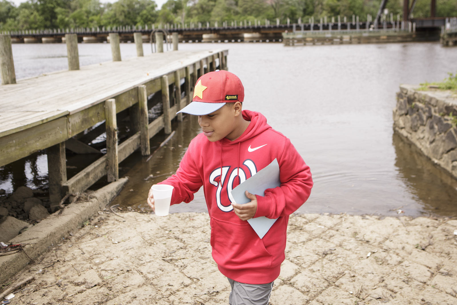  A student returns after releasing American shad fry into the Anacostia River. In 2017, D.C. mayor Muriel Bowser declared American shad the official fish of Washington, D.C. Though the Potomac is fully restored, American shad in the Anacostia are not
