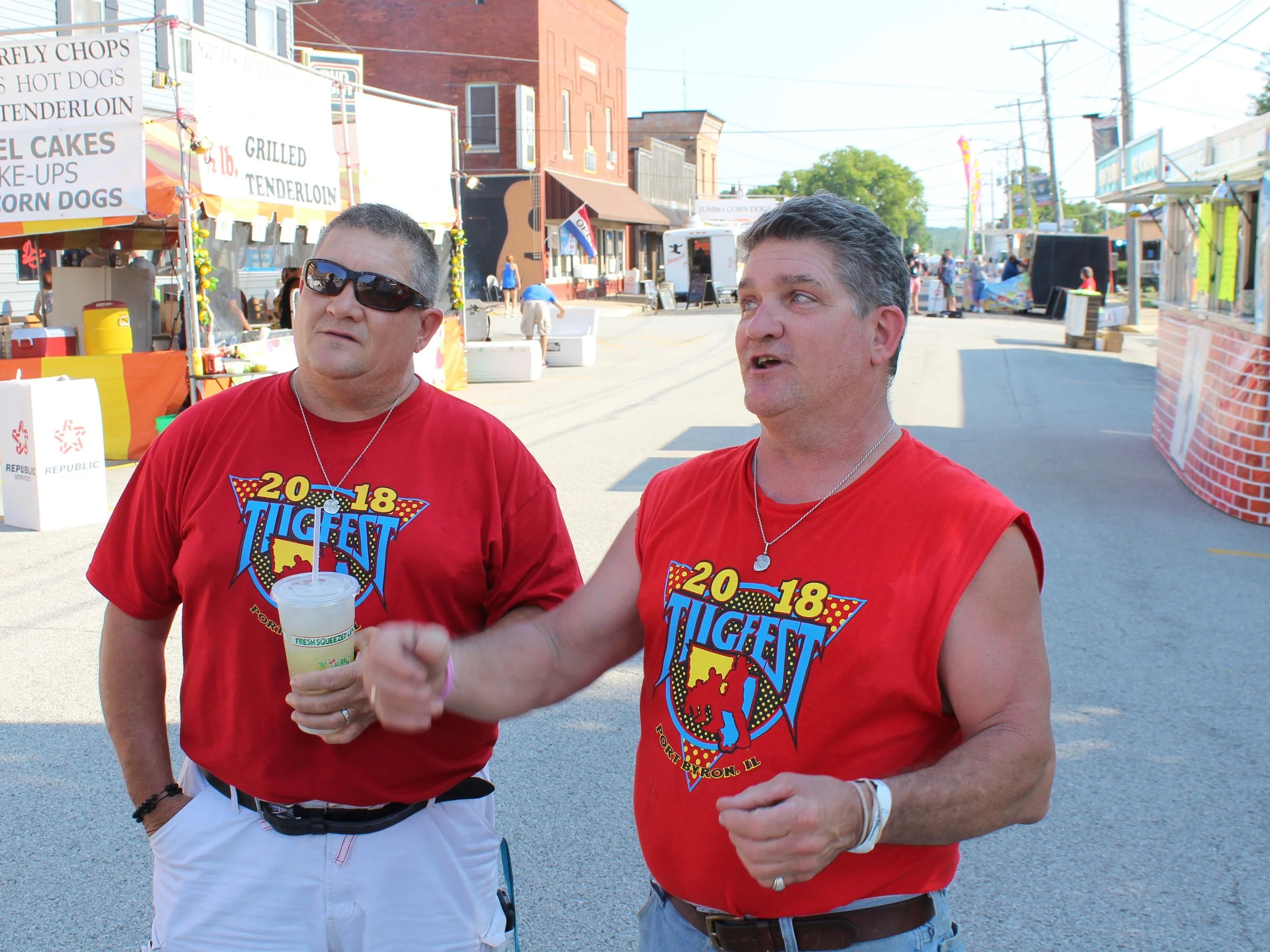 Marty and Matt Russell talk about how they rev up the crowd as "tug emcees" on the Port Byron side of the Great River Tug Fest. (One Illinois/Ted Cox)