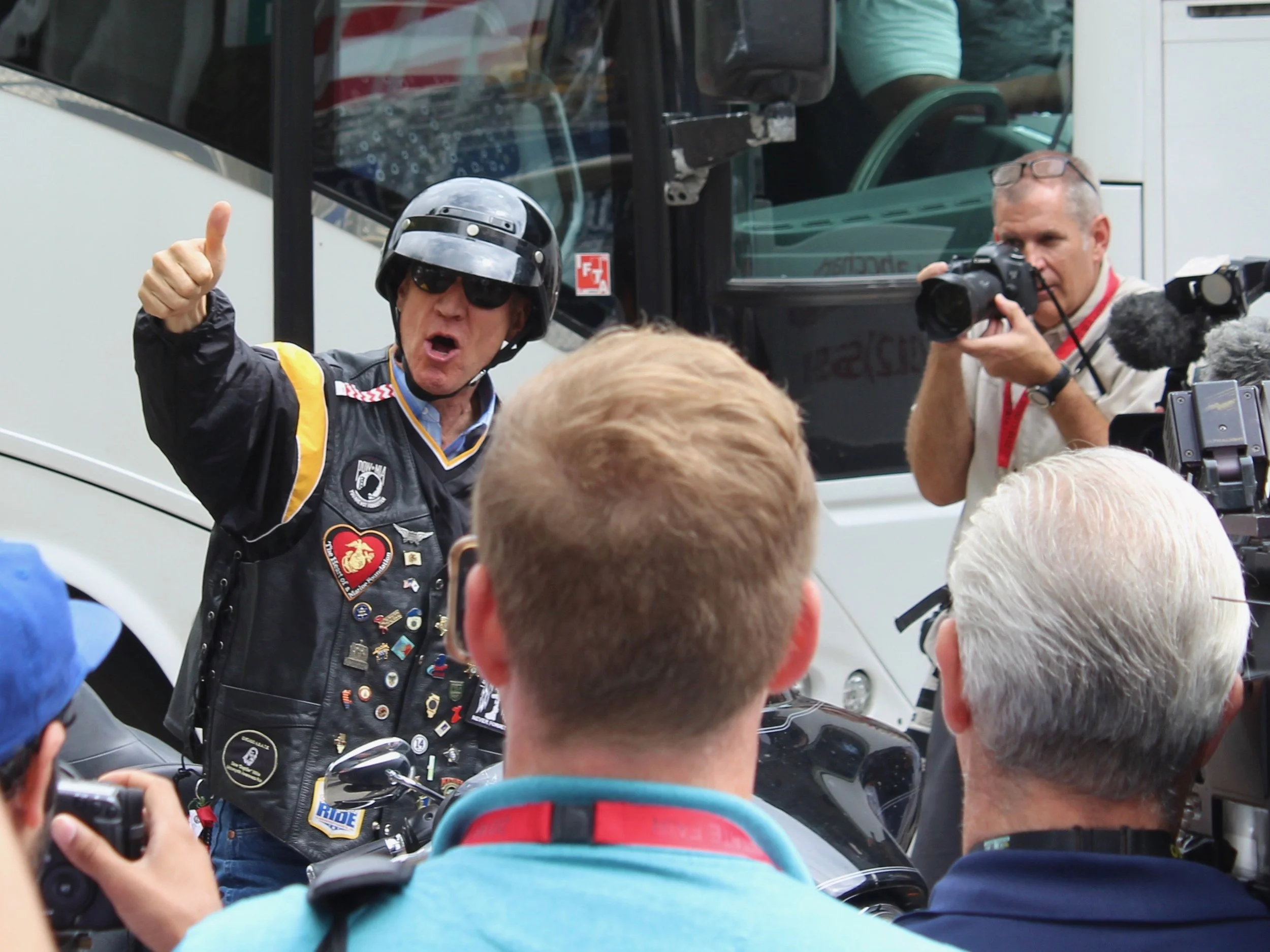 While supporting President Trump's trade war, Gov. Rauner rumbled up to a political rally at the State Fair Wednesday on a Harley. (One Illinois/Ted Cox)
