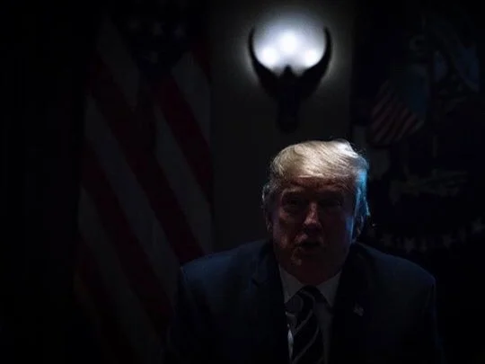 President Trump as the lights were inadvertently turned off during a speech at the White House earlier this year. (Twitter)