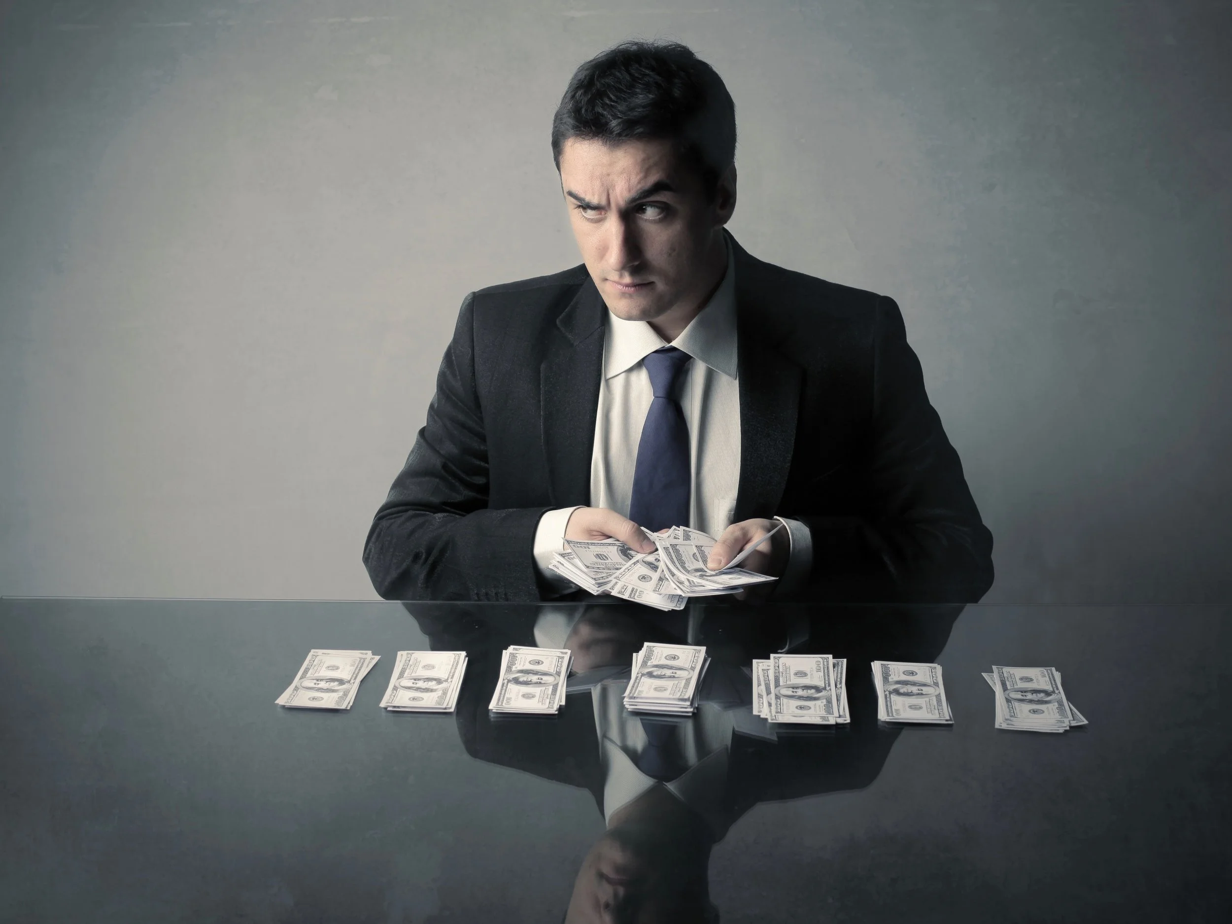 Million-dollar earners might have less money to count if a progressive income tax passes. (Shutterstock)