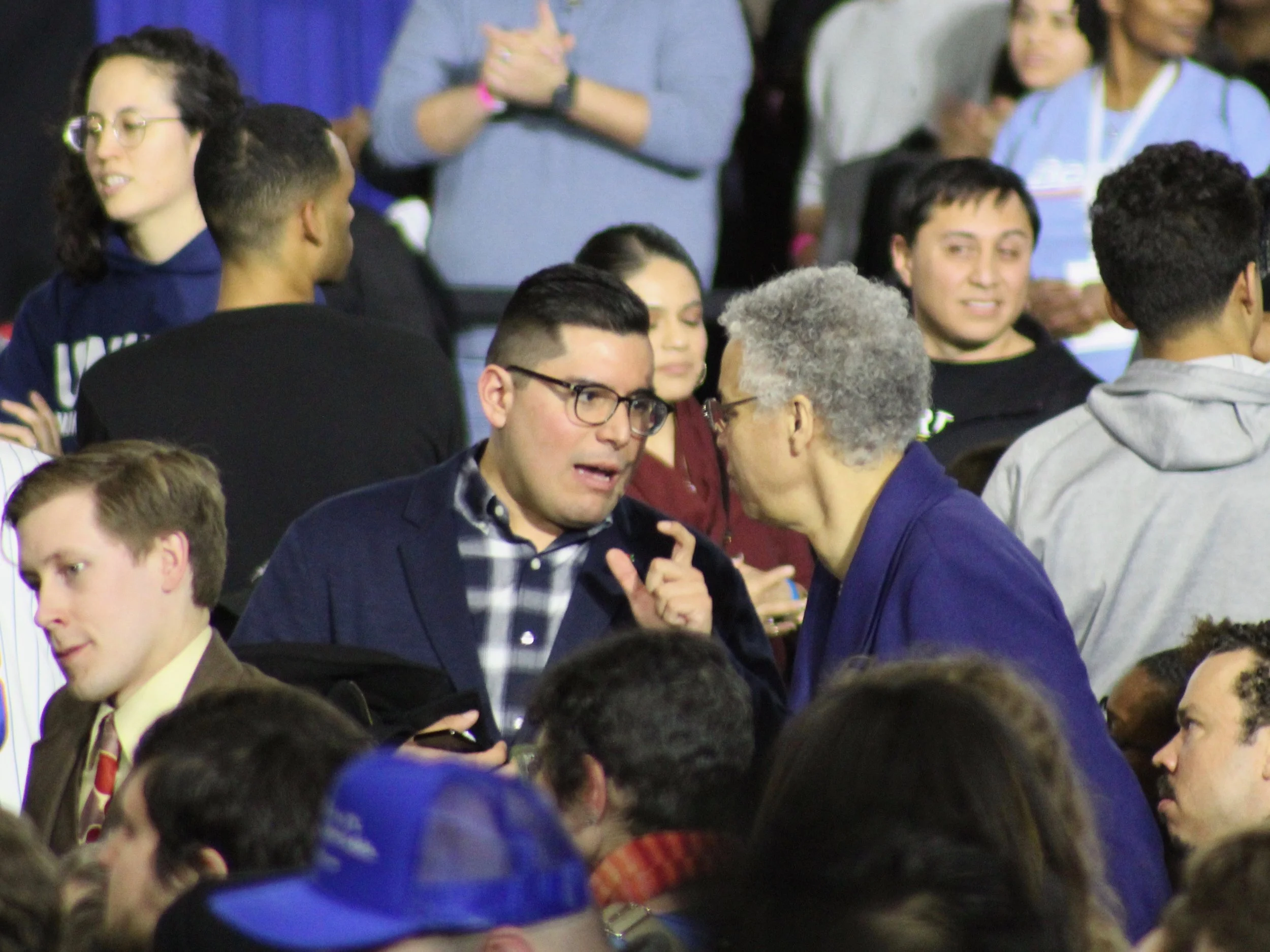 Chicago Alderman Carlos Ramirez-Rosa and Cook County Board President Toni Preckwinkle talk at a Bernie Sanders rally in Chicago earlier this year. (One Illinois/Ted Cox)
