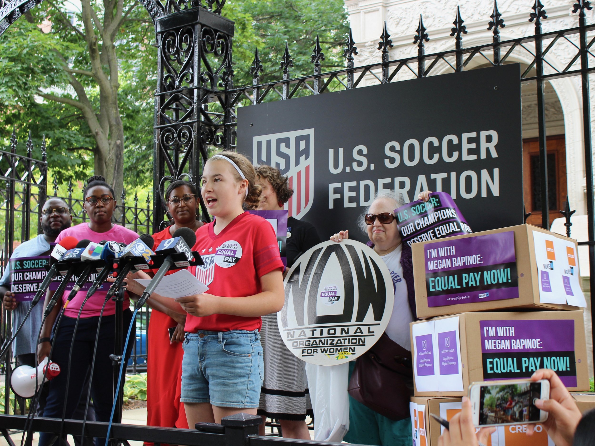 Greta Lindall, a seventh-grade soccer player at Skinner North Classical School in Chicago, speaks out in support of equal pay for the U.S. Women’s National Team outside the U.S. Soccer Federation. (One Illinois/Ted Cox)