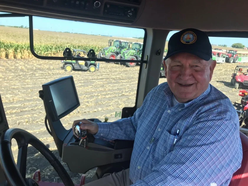 U.S. Agriculture Secretary Sonny Perdue rides farm machinery at the Farm Progress Show in Decatur on Wednesday. (Twitter/Farm Progress Show)