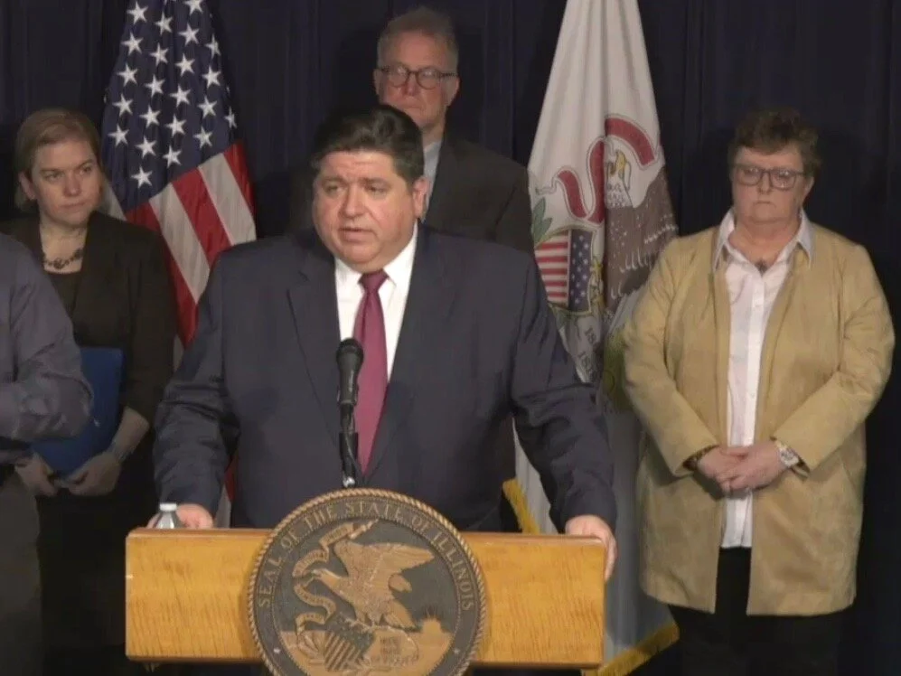 Gov. Pritzker heads a news conference on the coronavirus Monday at the Thompson Center in Chicago. (Illinois Information Service)