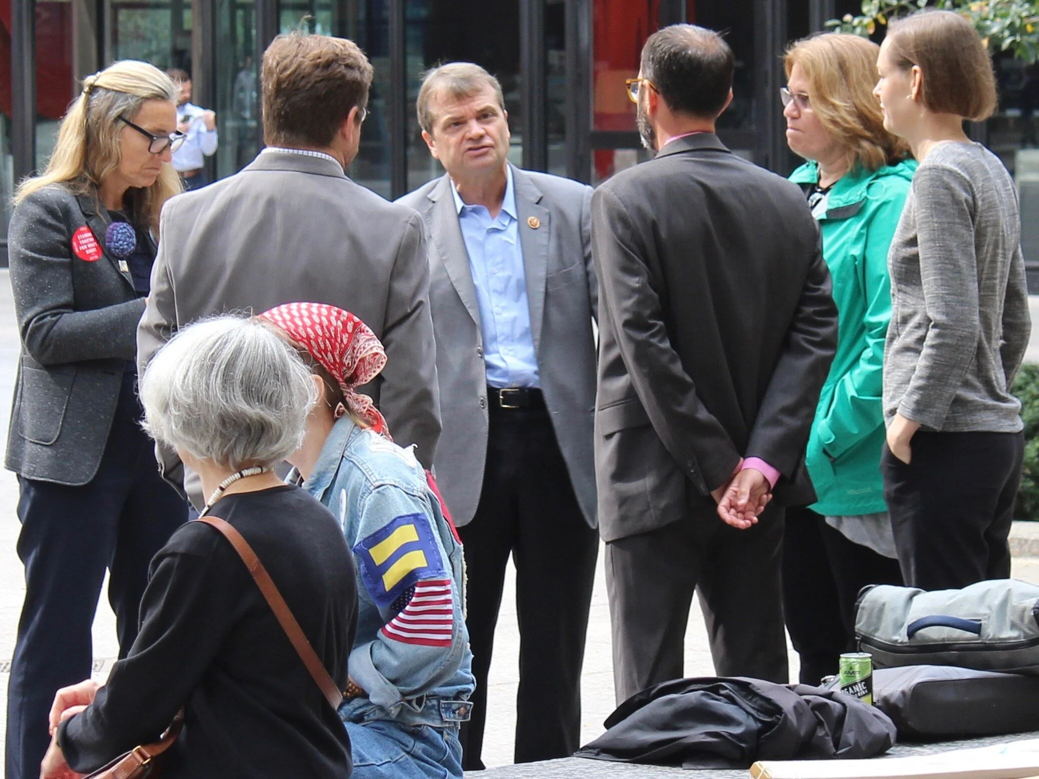 U.S. Rep. Mike Quigley talks with environmental activists before a demonstration in Chicago two years ago. (One Illinois/Ted Cox)