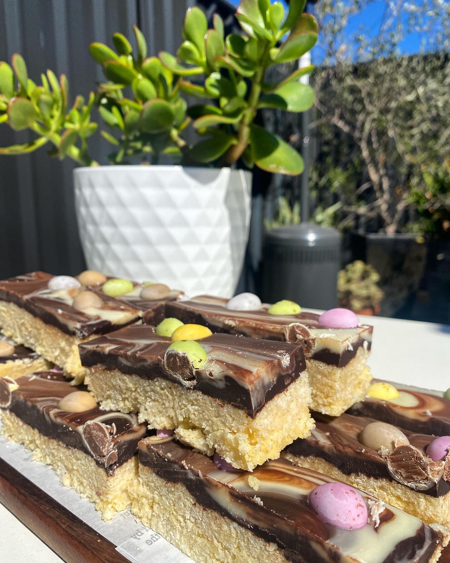 Our chef has made some special marble coconut cookie slices topped with lil chocolate eggs, grab some before they hop out the door this Easter 🐰👀