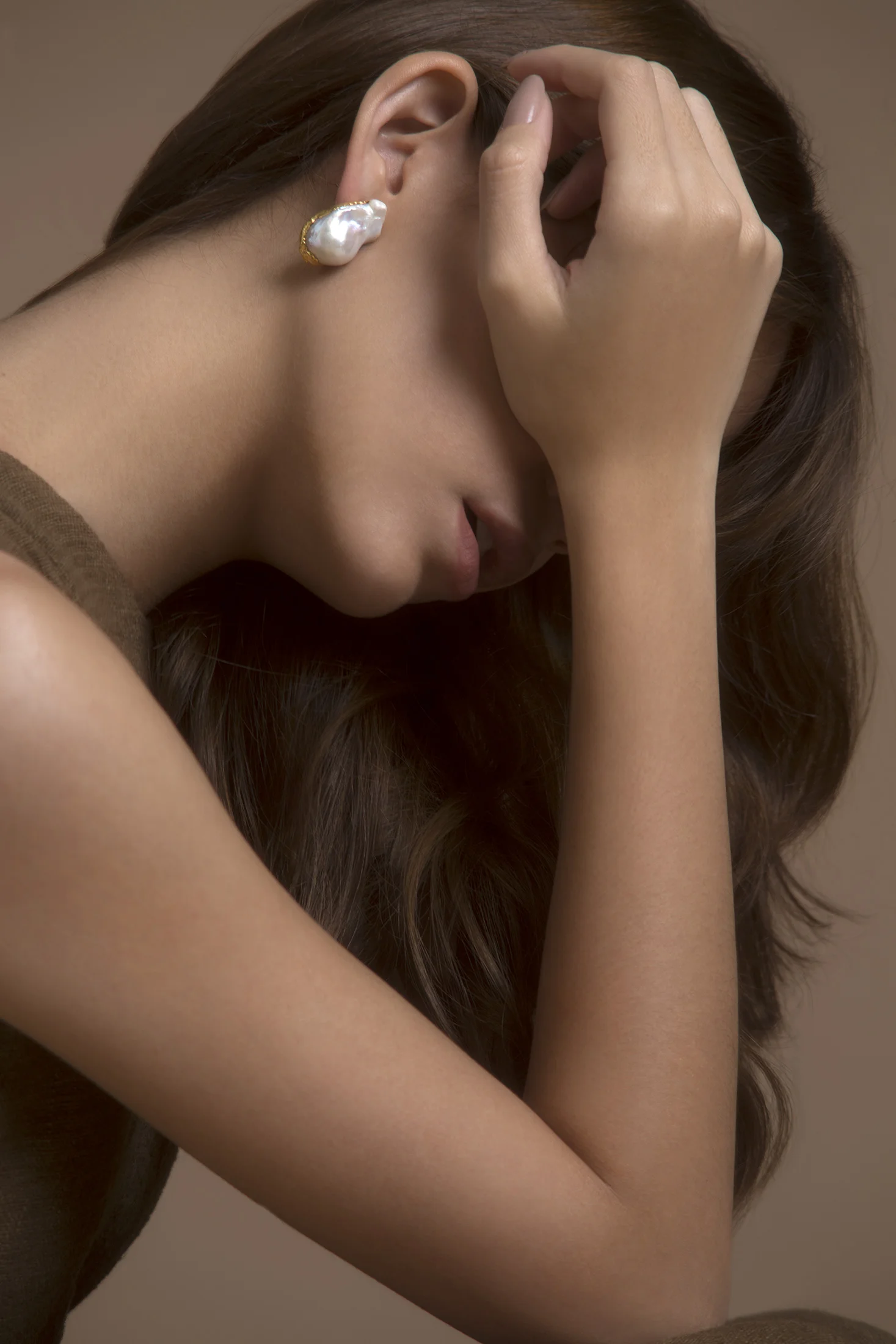 Dhin earrings on model.jpg