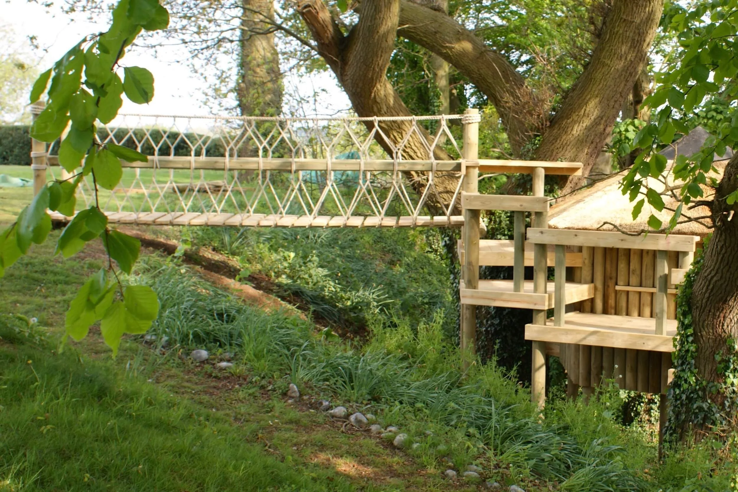 Rope Bridge entrance to treehouse on steep gradient