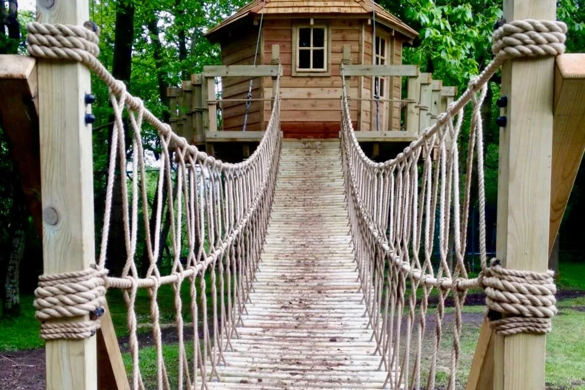 Log Rope Bridge entrance to suspended treehouse