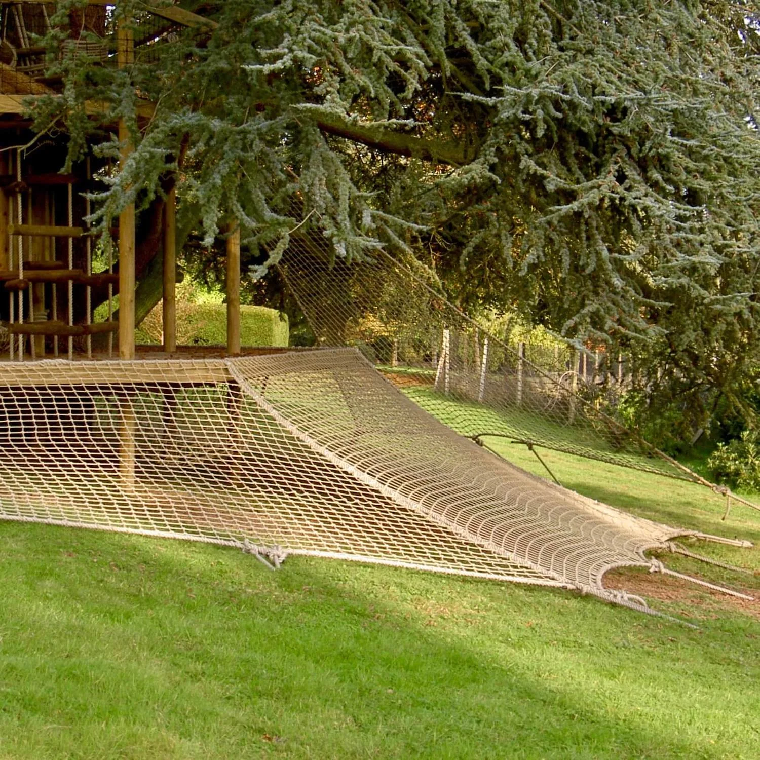 "...large family deck wrapped with a scramble net"