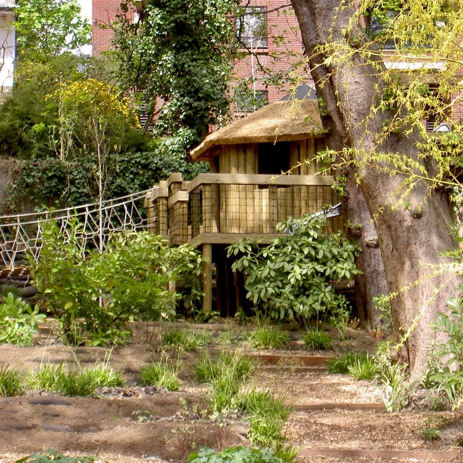 "...with thatched roof and rope bridge"