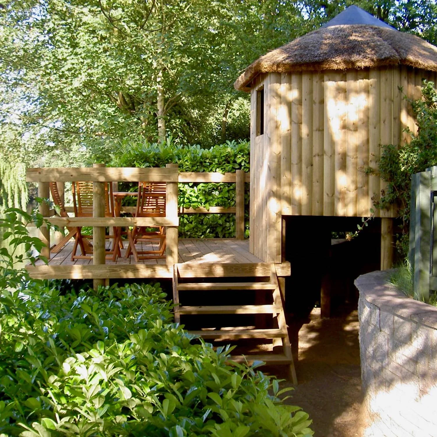 "...deck, stairs and garden treehouse"