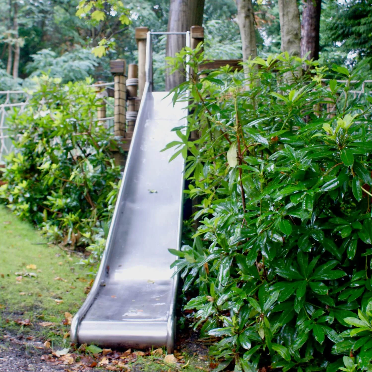 "...stainless steel slide from a platform deck"