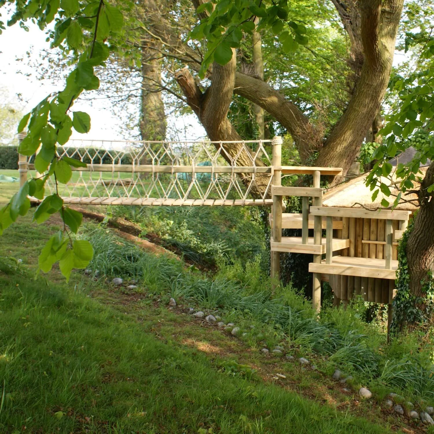 "...rope bridge across steep gradient"