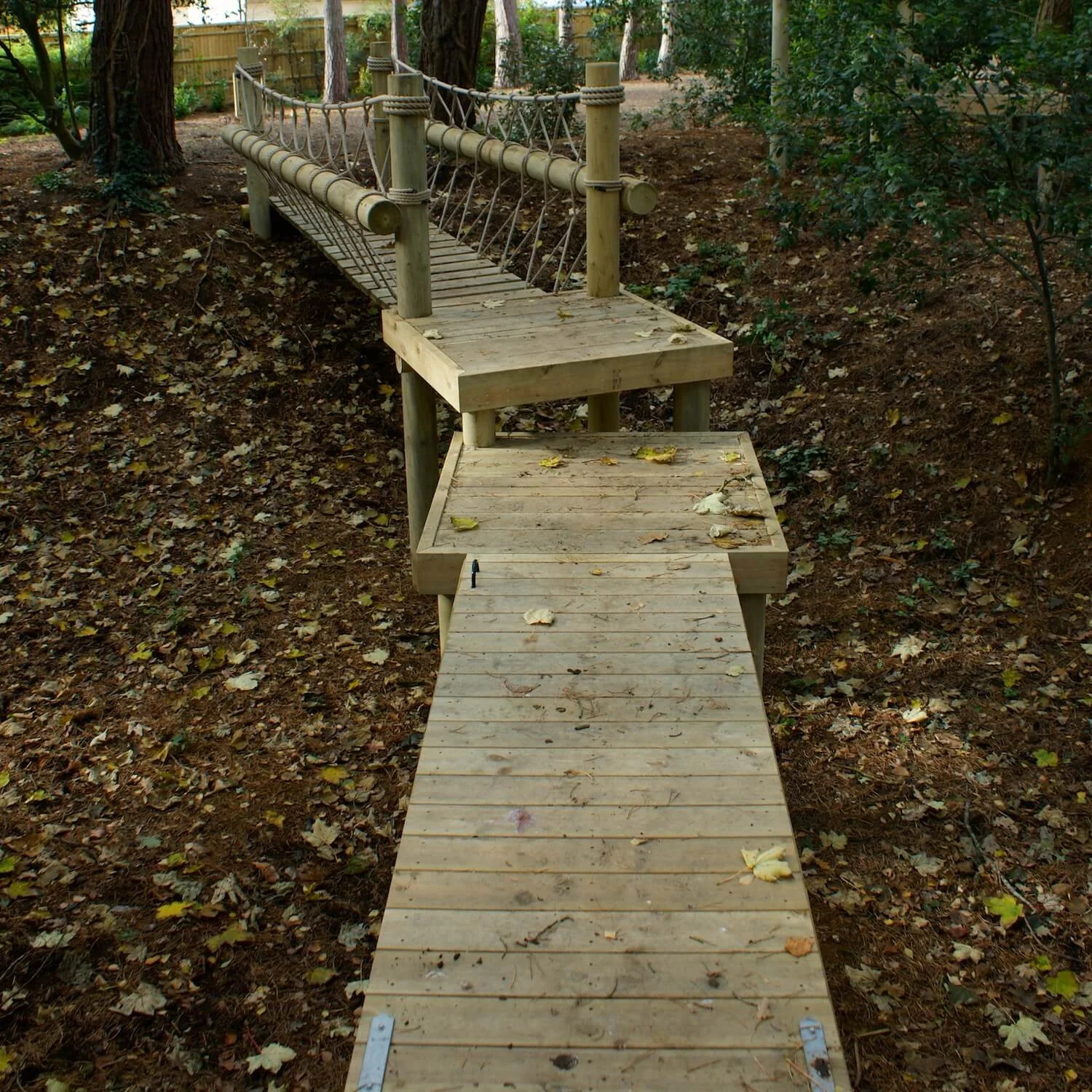 "...rope bridge linked to a drawbridge"
