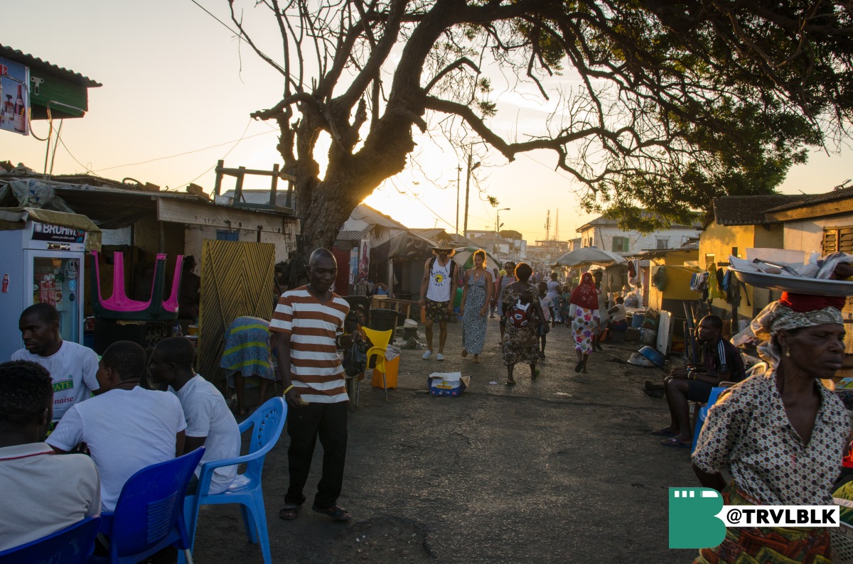An image of the group exploring Jamestown at sunset - a fishing village and one of the oldest settlements in Accra. Photo credit: Kumi Rauf, Founder - Traveling Black