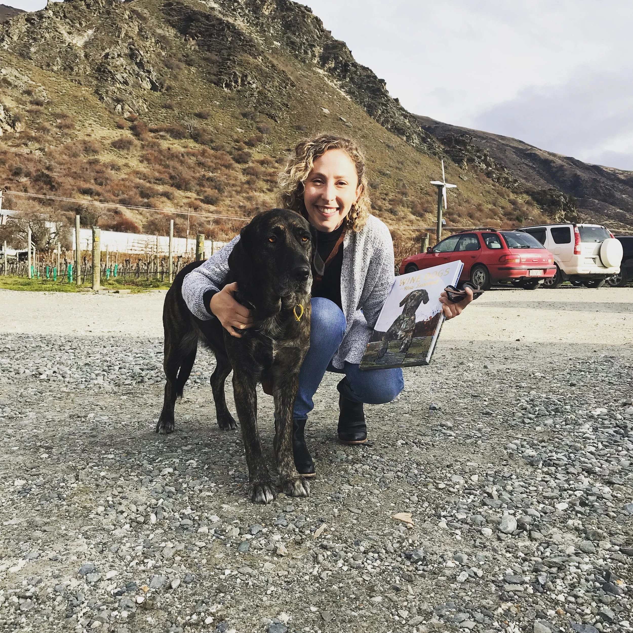 Posing with Phoebe, one of the ‘wine dogs’ and book cover star, outside of Brennan Wines Central Otago