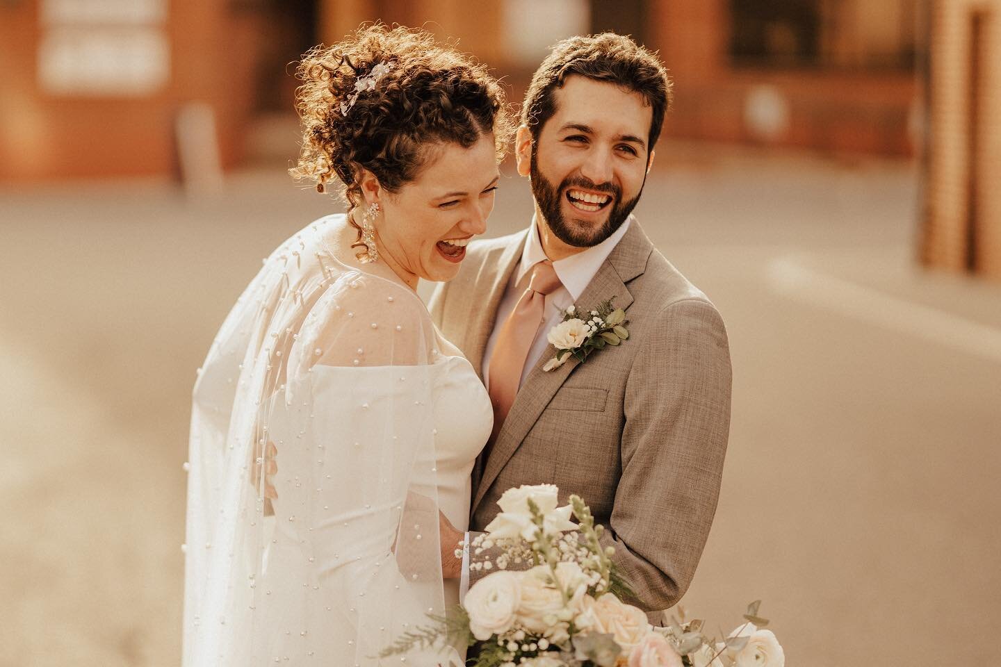 Maddie + David couldn&rsquo;t look at one another without giggling or smiling ear to ear. The joy and love that surrounded them yesterday as they started their forever was electric! Although freezing outside, the warmth of their love + supportive fam