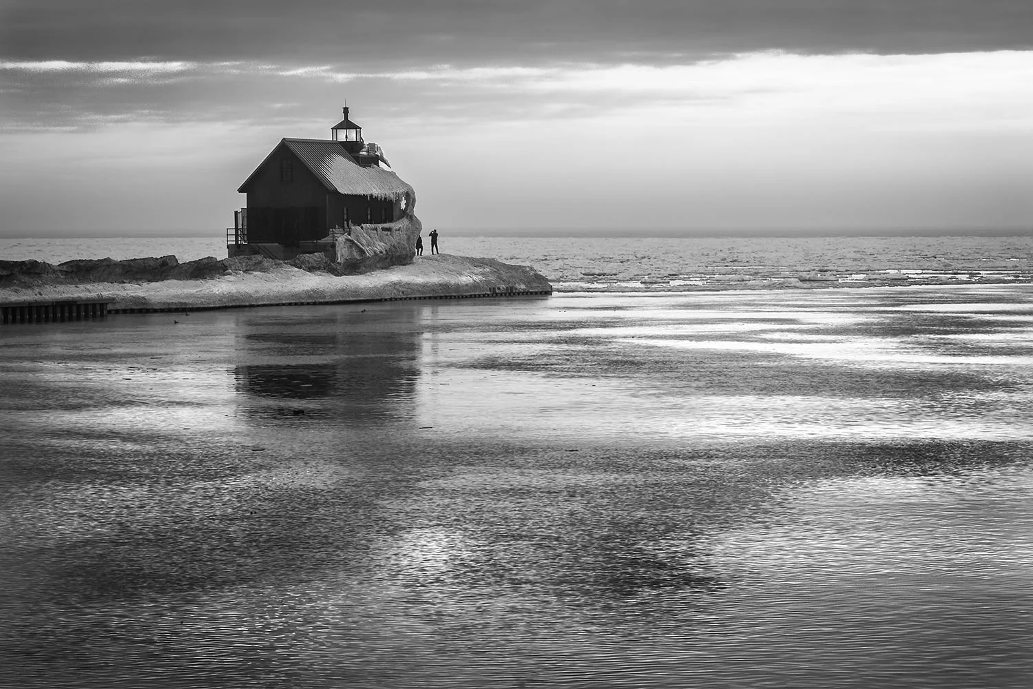  Dusk settles in over Lake Michigan, at the channel in Grand Haven, MI. 