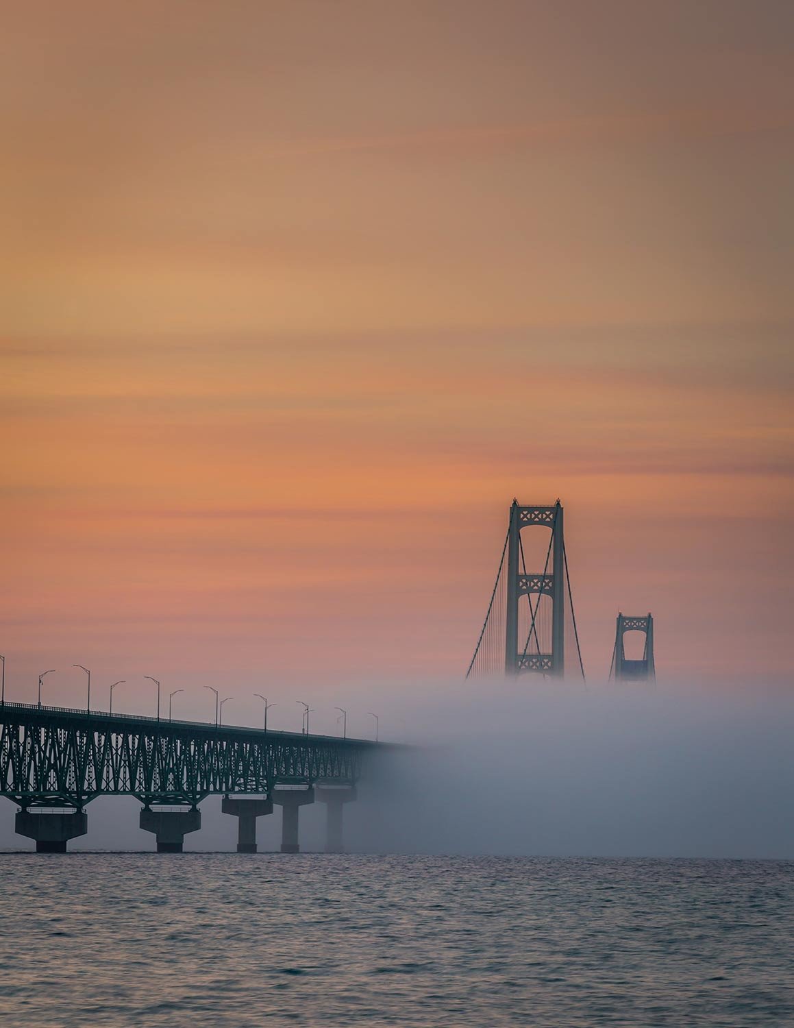  A fog shrouded Mackinaw Bridge after sunset 