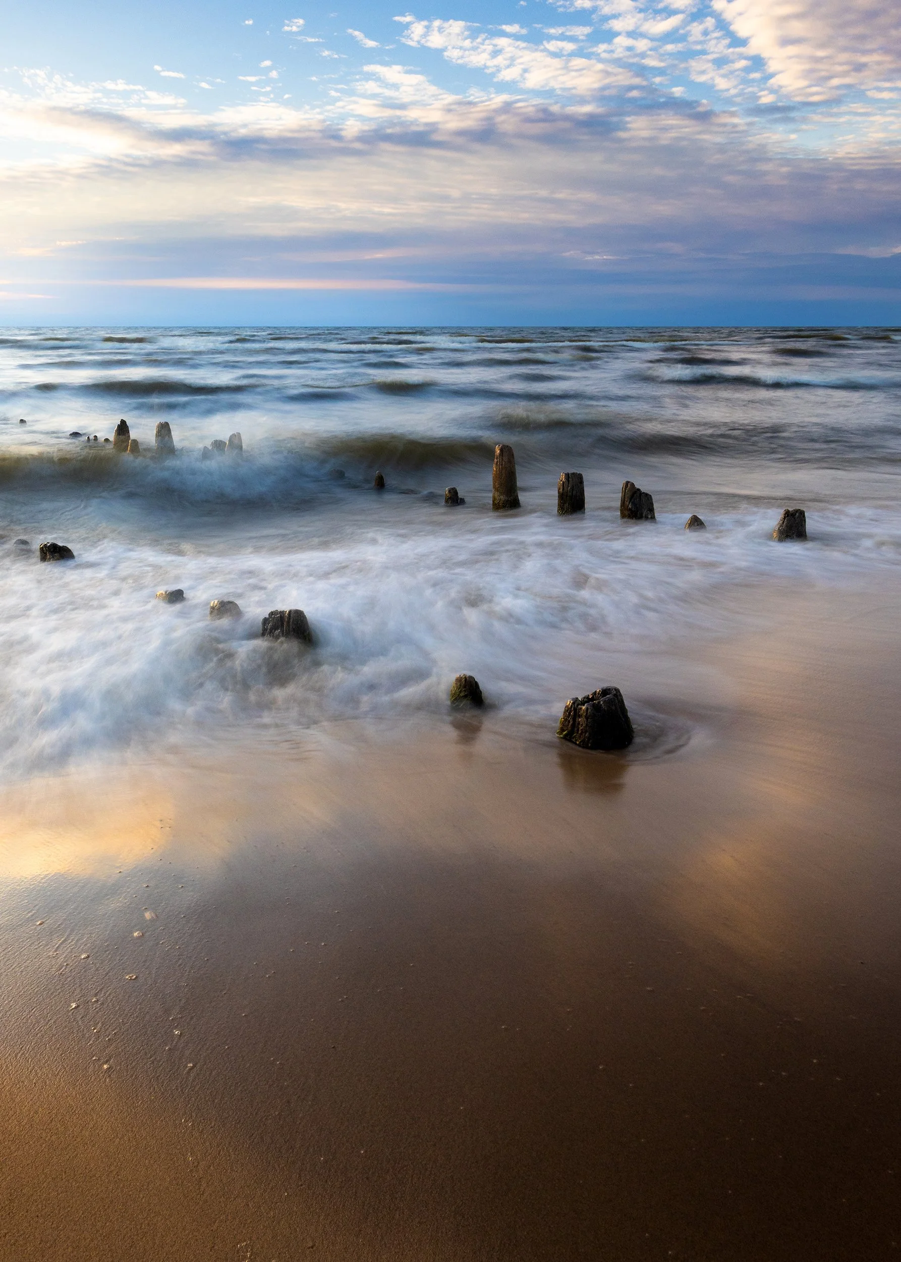 Late day light over a Lake Michigan beach