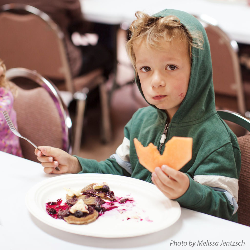 Boy and cantaloupe 1024 square with credit.jpg