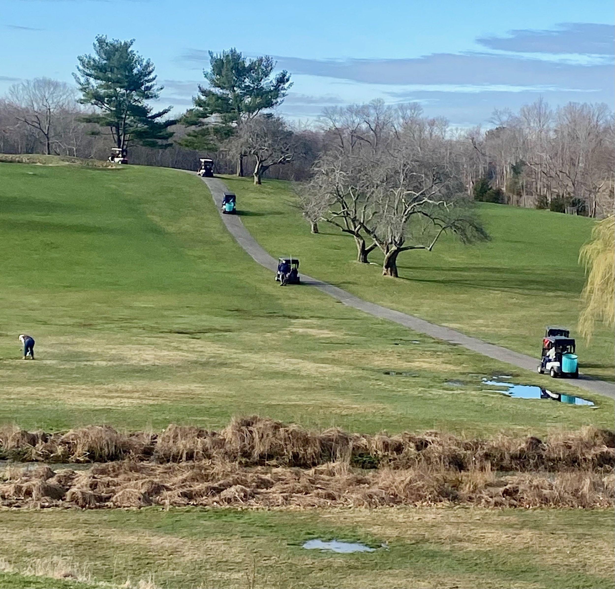 Heading out to clean up the course