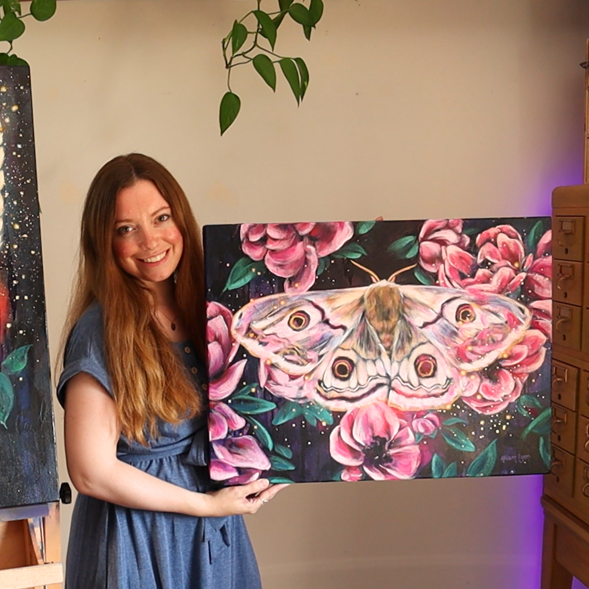 Copy of me with untethered moth painting.png