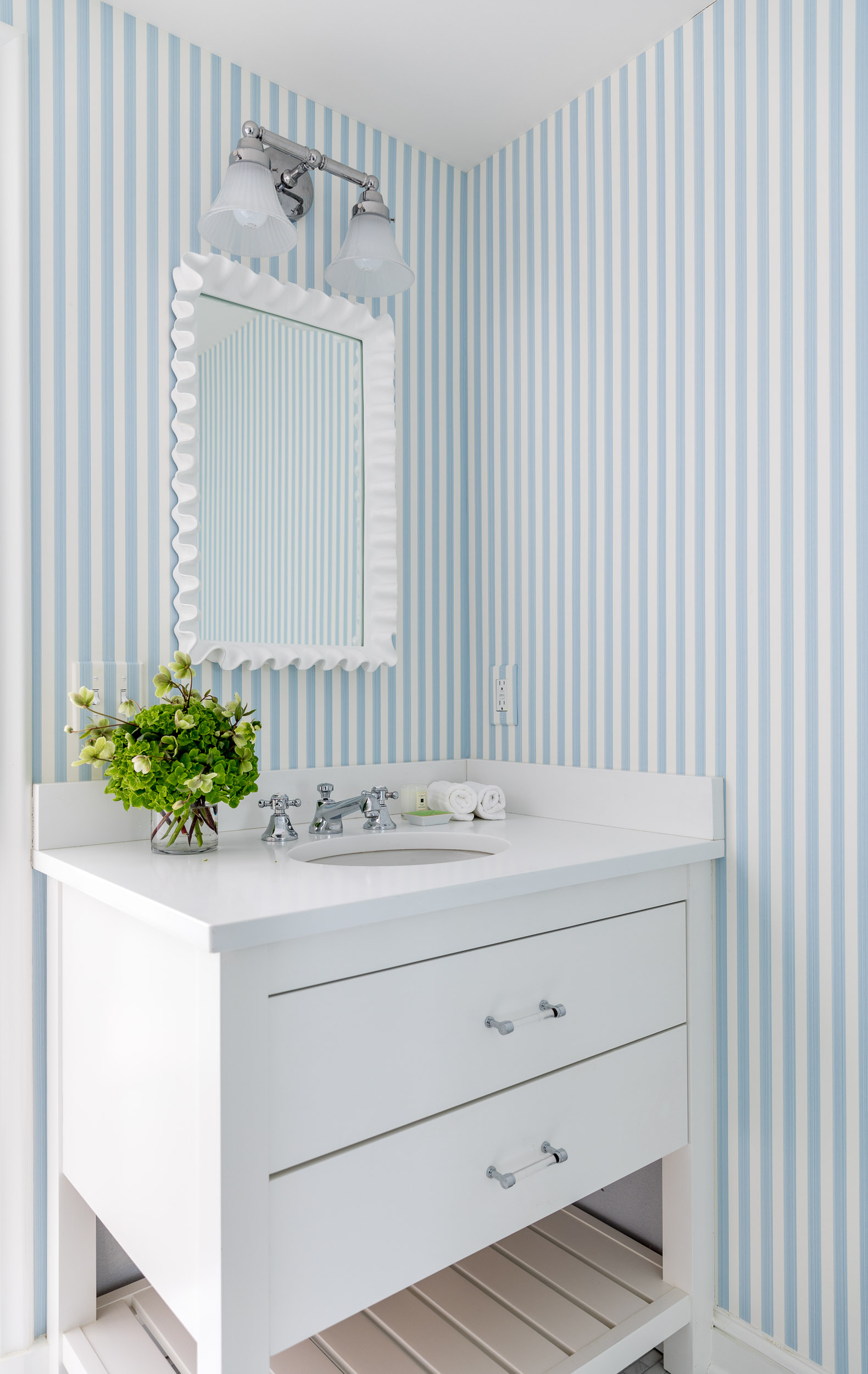 blue-wallpaper-bathroom-white-vanity-clean