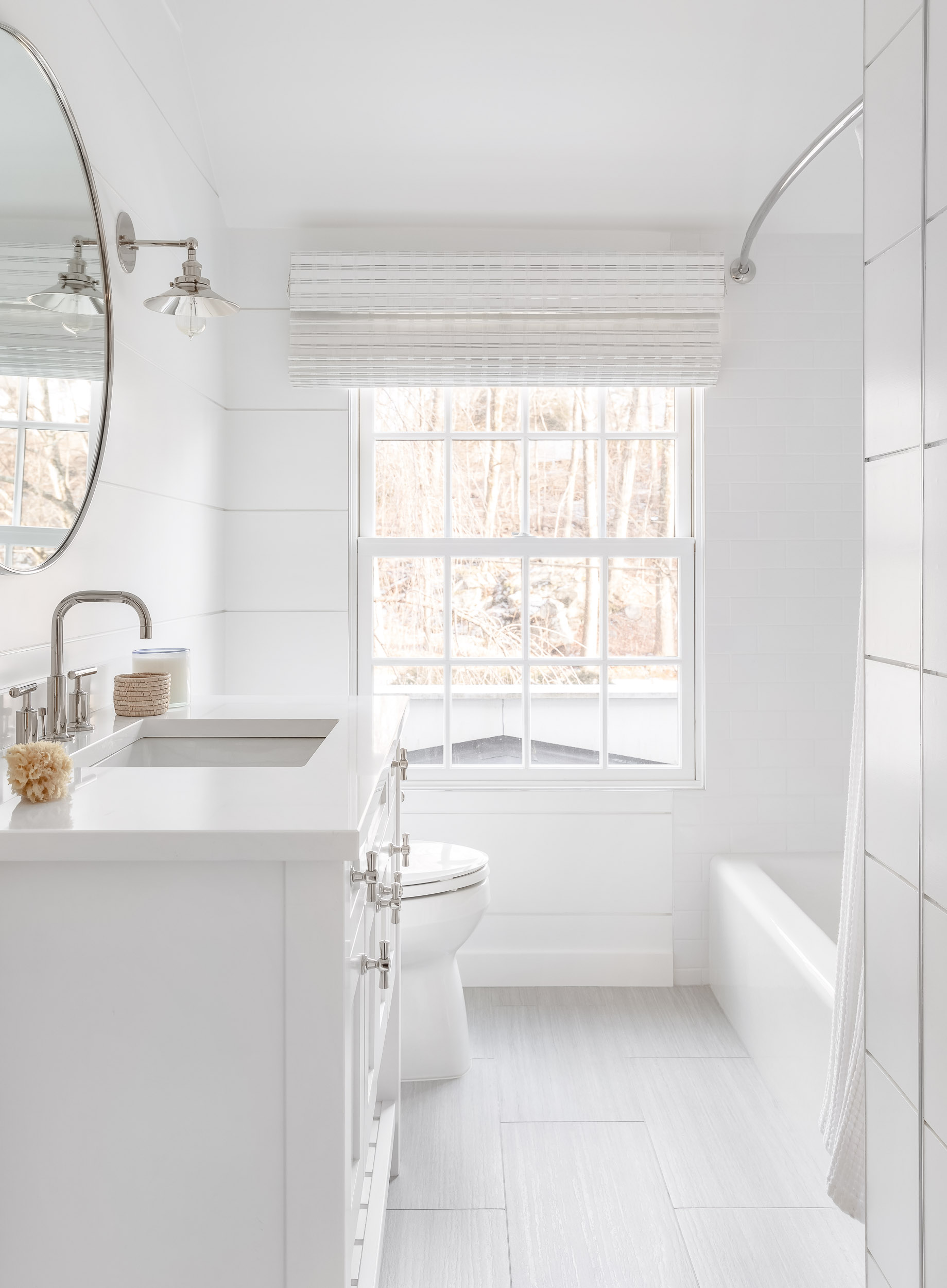 clean-white-roman-shades-bathroom