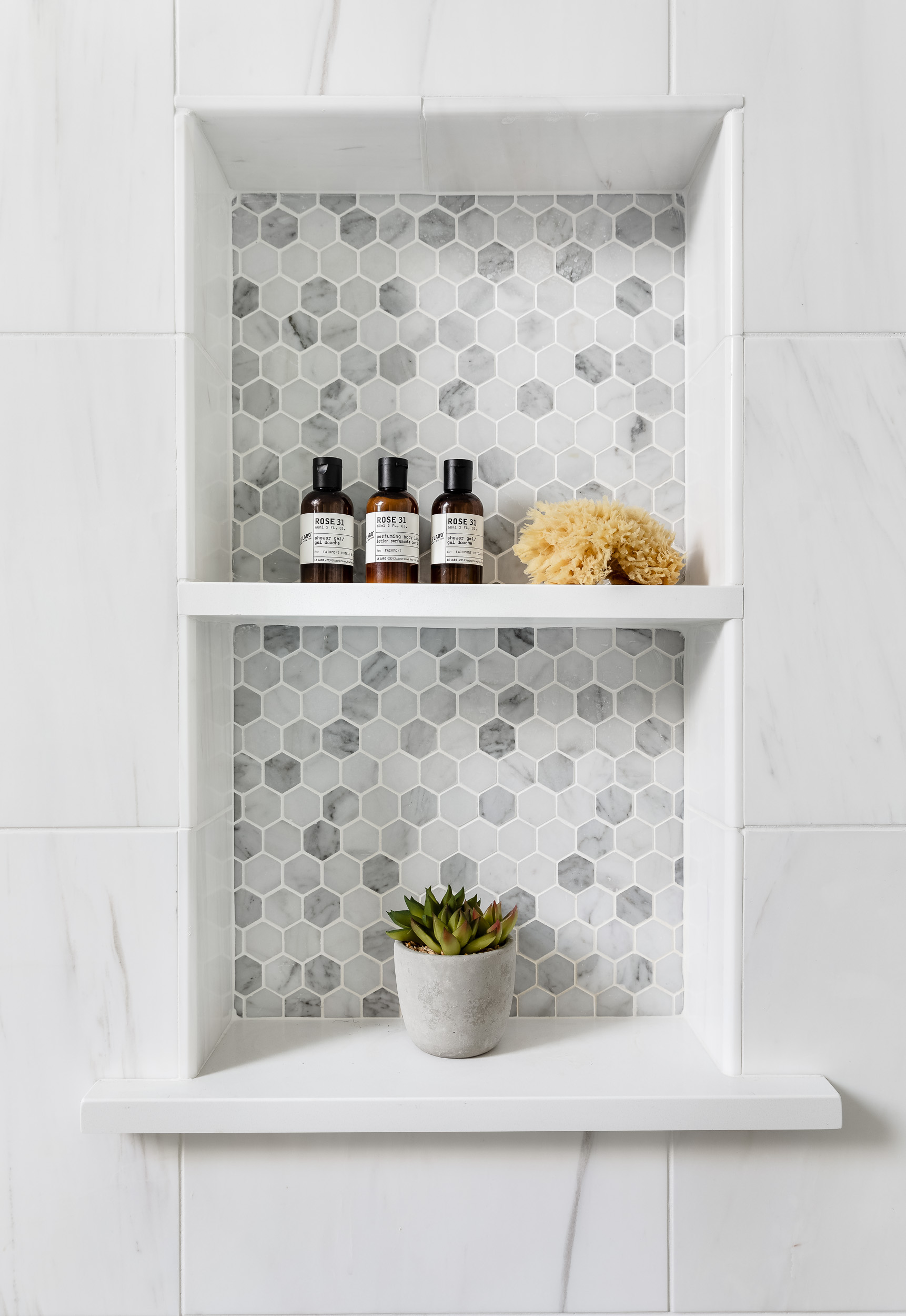 clean-marble-shower-organization-style