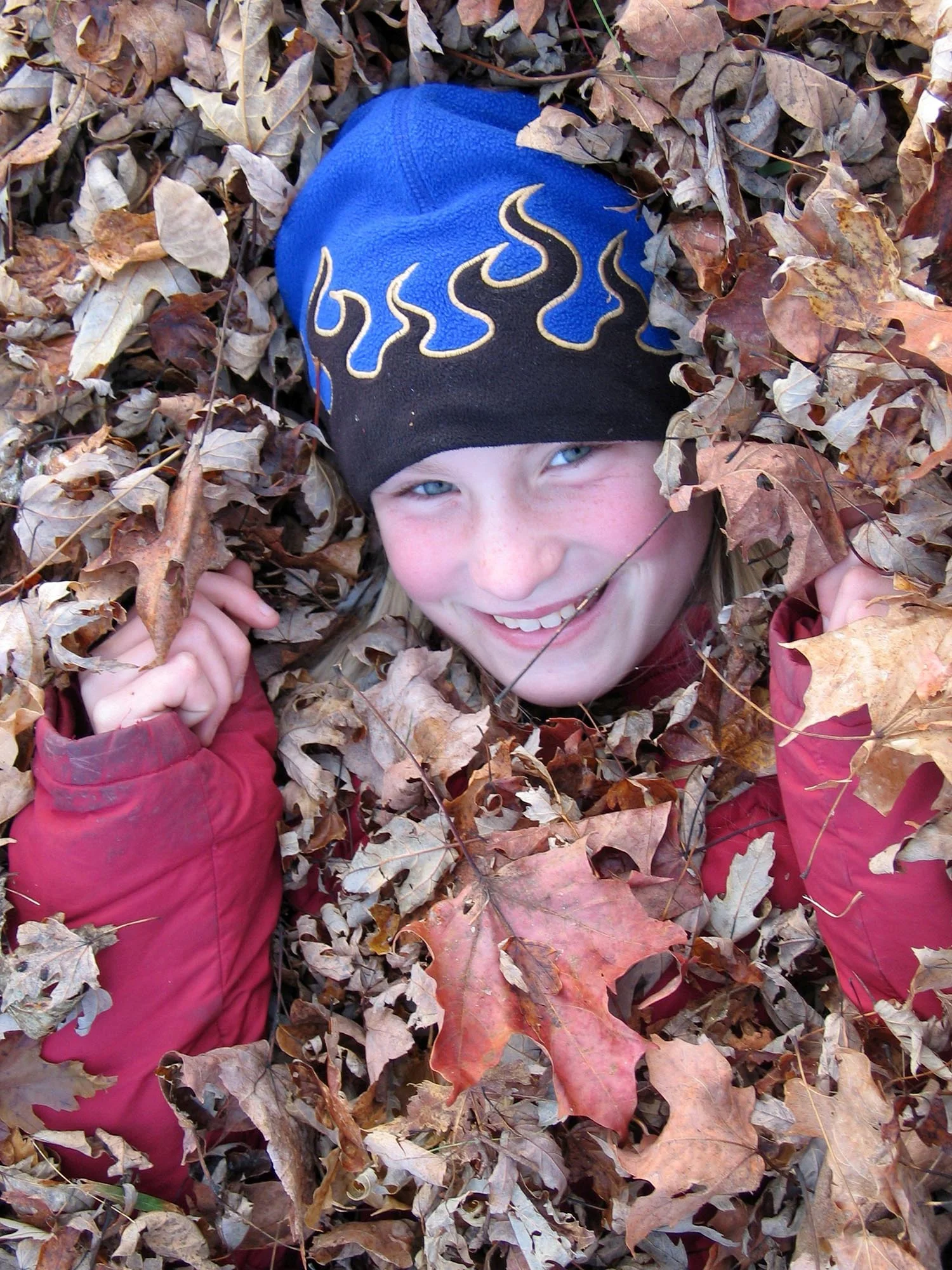 Copy of kid in leaves.jpg