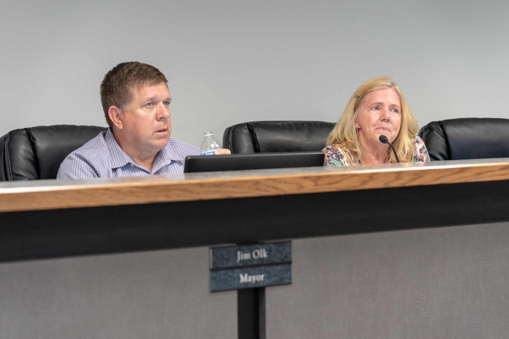 Mayor Jim Olk (L) and Mayor Pro Tem Kathleen Poole (R) explain that annexation allows Lucas to control important development issues.