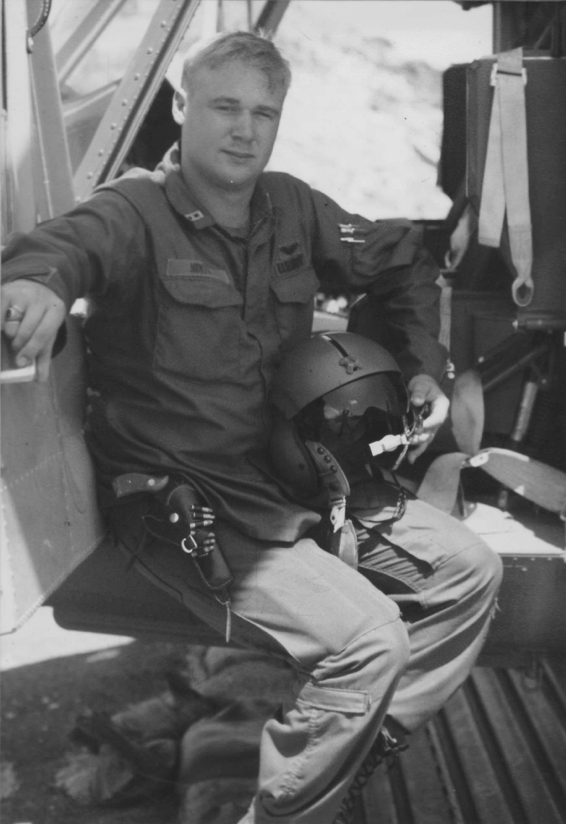 L. Michael Mints was a 21-year-old aircraft commander when this photo was taken in 1969. He is in a Bell UH-1H on a landing zone in Pleiku, Vietnam