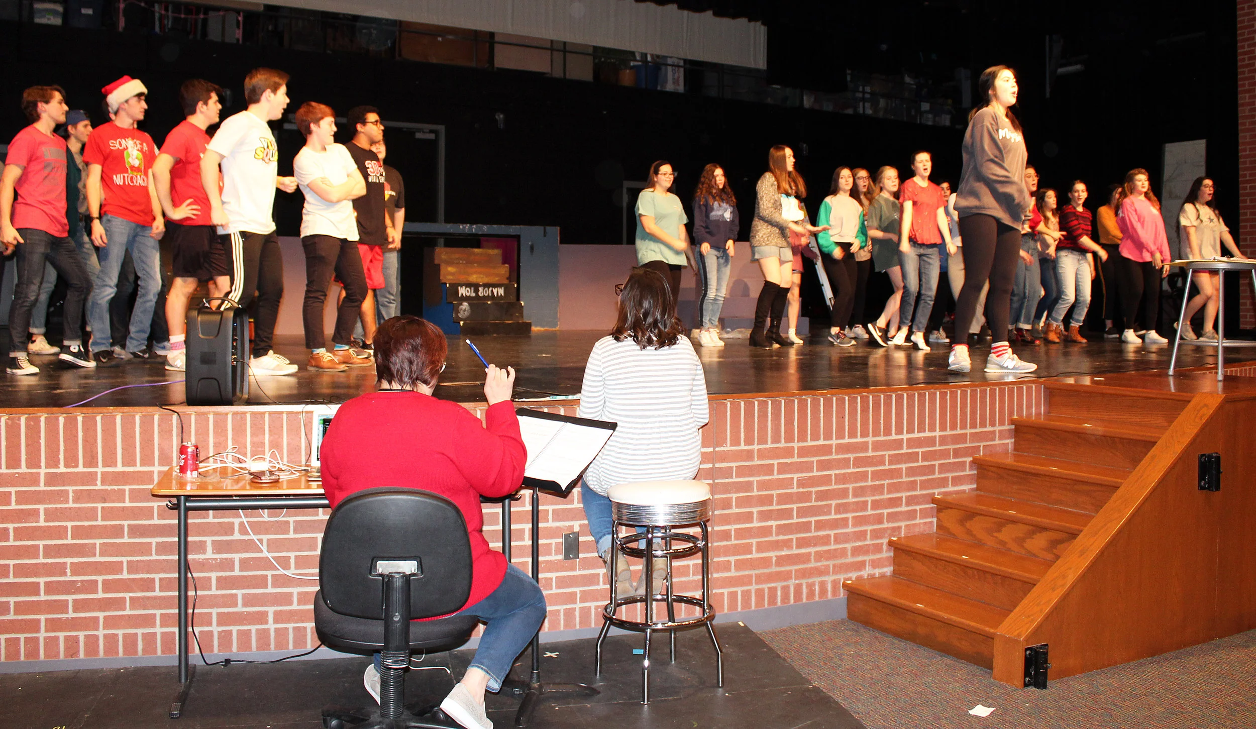 Cathy Koziatek (music director), Jessica Brewster (director) and Delaney Walker (student choreographer).