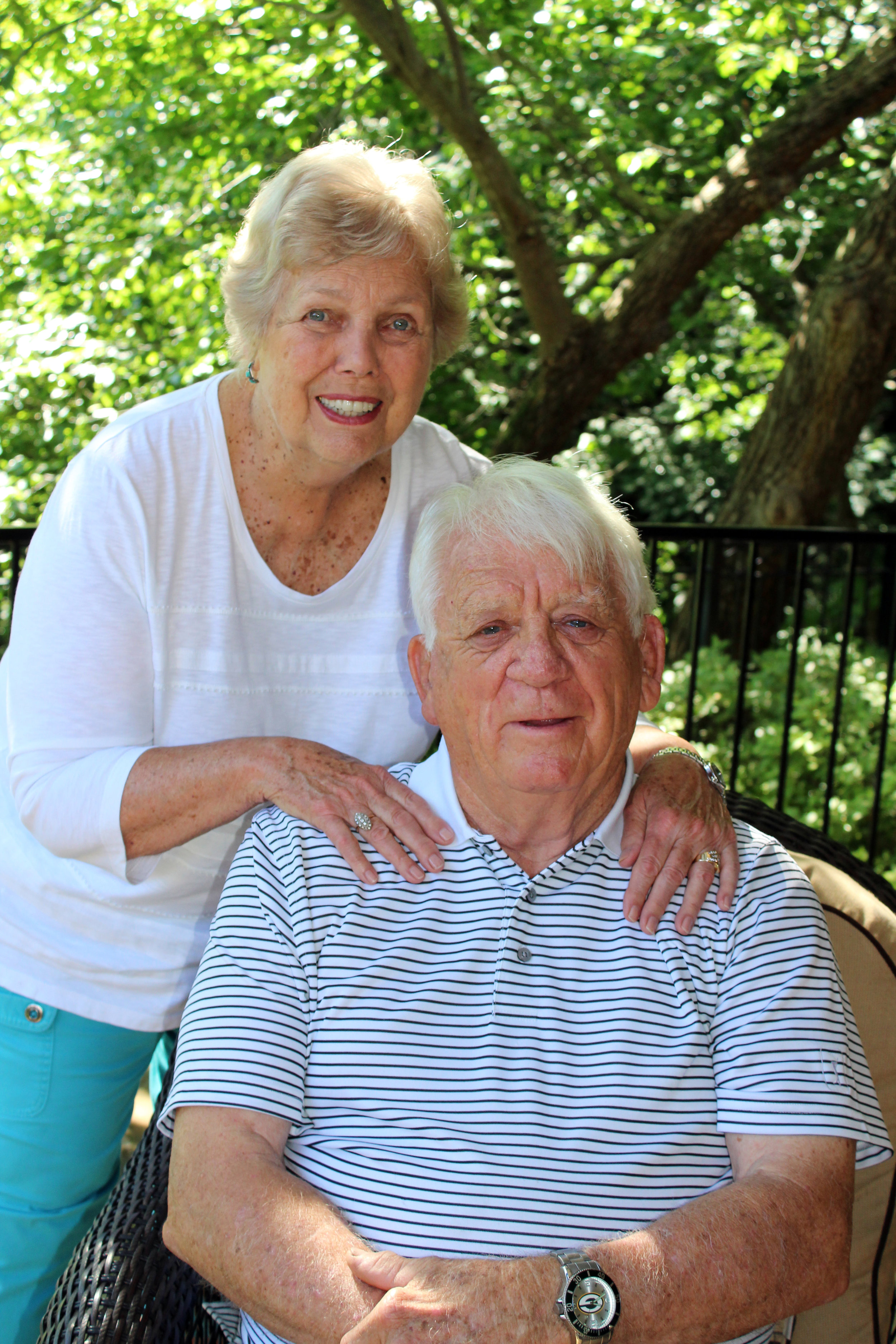 Harry and Lois Crosby’s flagstone patio with cedar, pergola-style rounded cover provides a private and tranquil paradise.