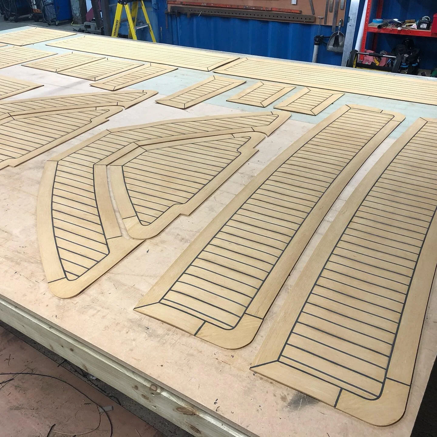 Two sets of decks for #barnsbrinkcraft colour is teak/black lines with margins. #flexiteek2g #rofixrestoration #rofix #decks #norfolkbroads #suffolk #cambridge #sailing #boats #teak #syntheticteak