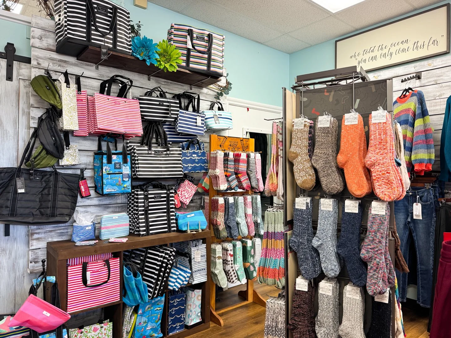 Selection of Scout utility bags, tote bags, and warm knit socks