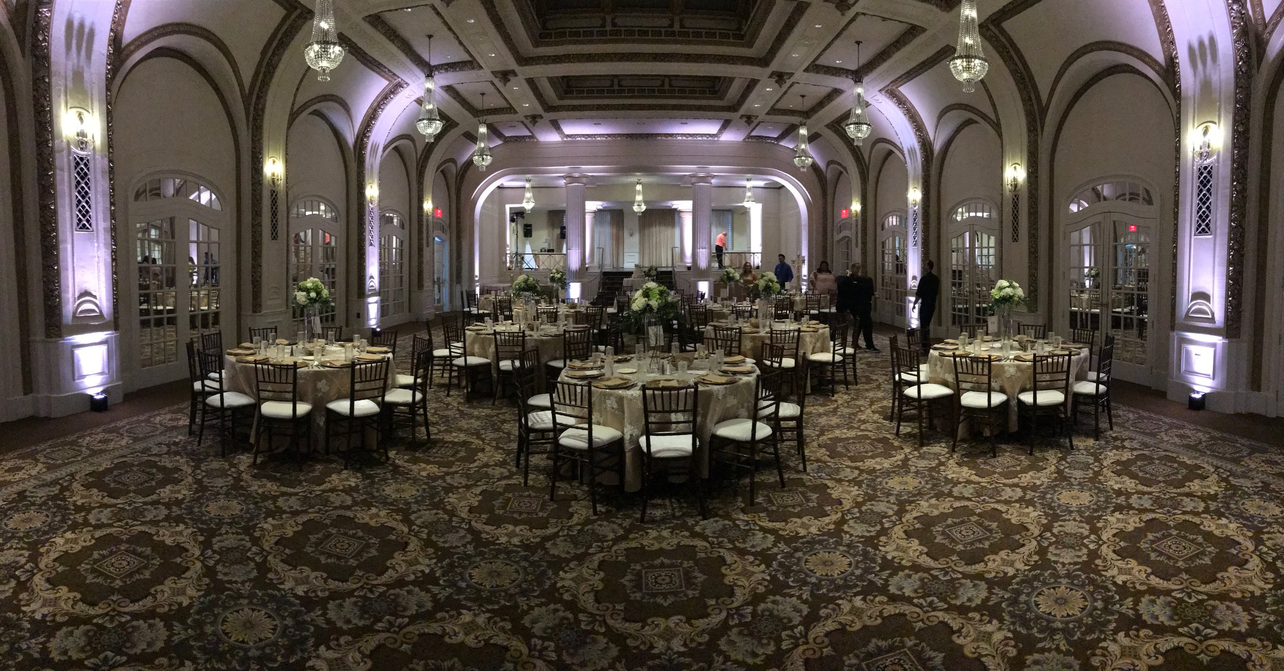 White colored uplighting Quad Cities Wedding Professionals